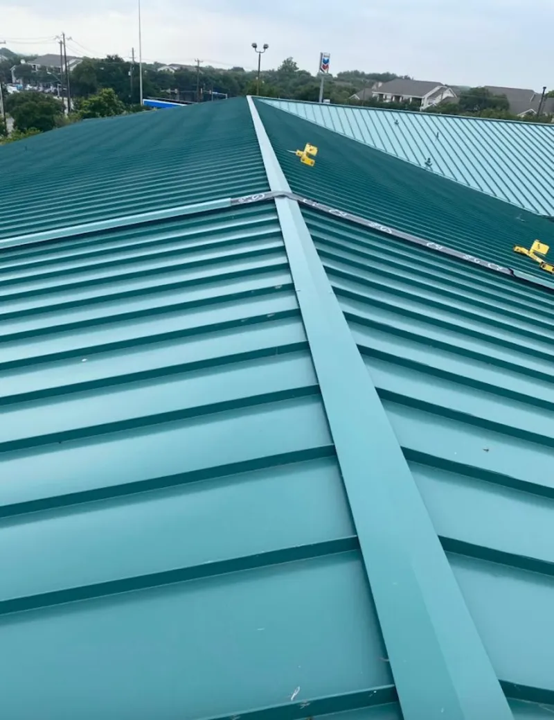 Green commercial metal roof ridge and valley for Metal Roof Repair in Wright
